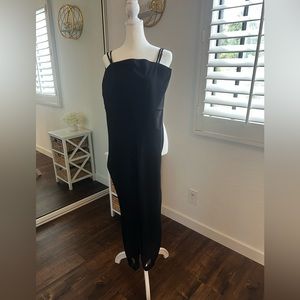 Express-Body Contour Matte squared neck Stirrup Jumpsuit.